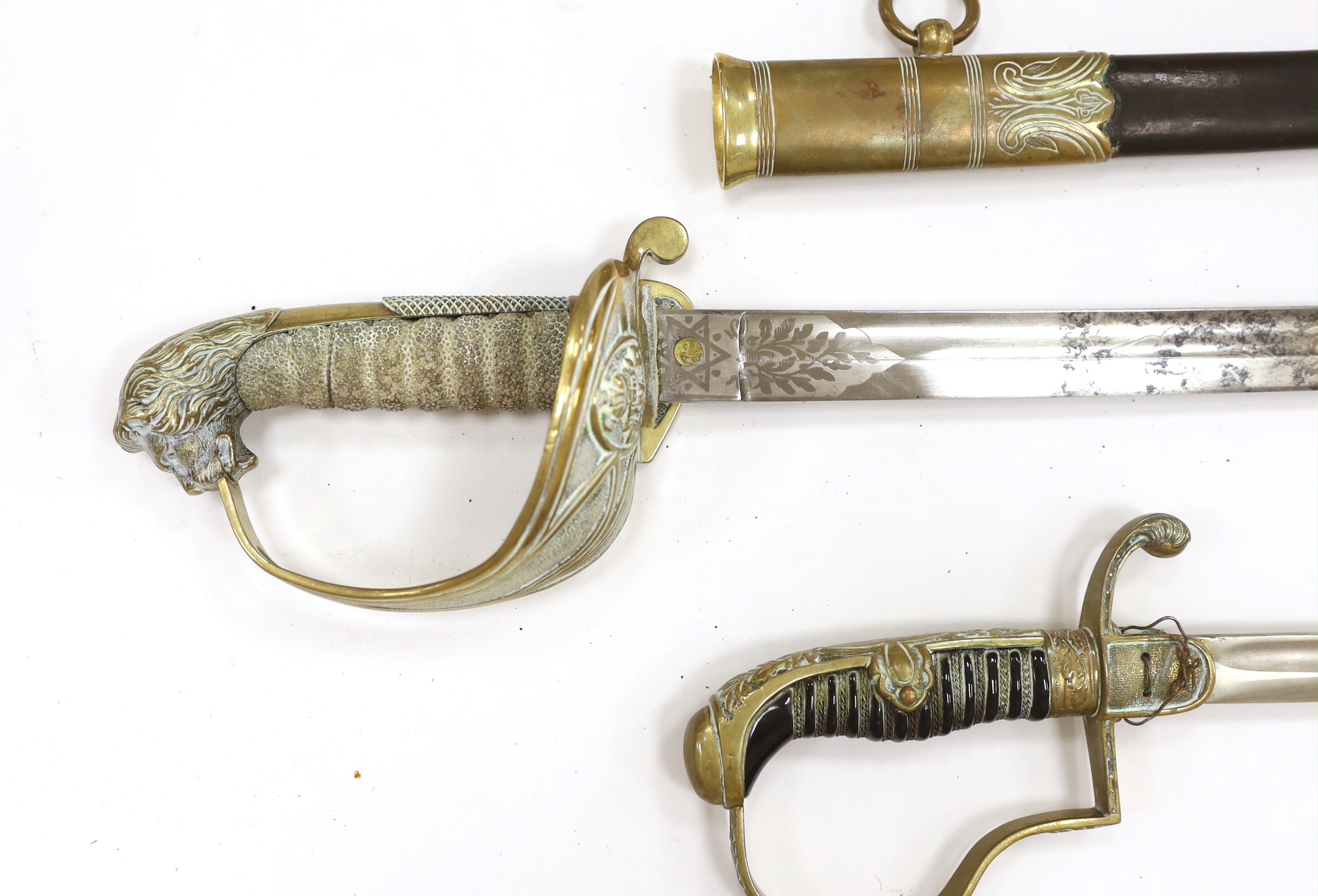 Victorian Royal Naval Reserves dress sword in brass and leather scabbard, blade 79.7cm and one other dress sword